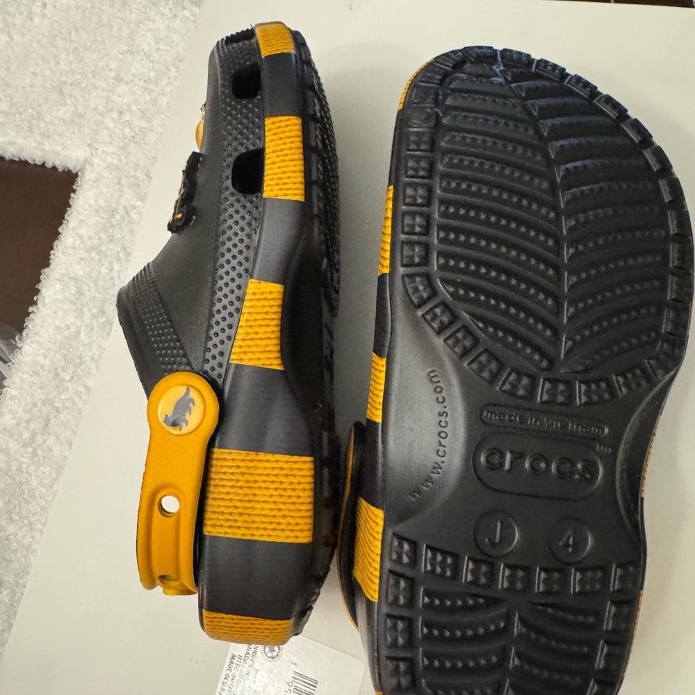 CROCS Kids' Black and Yellow Slip-On Sandals